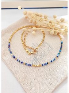 Atelier MIU Pozłacany naszyjnik z kryształami - dł. 45 cm rozmiar: onesize. Niebieskie naszyjniki Atelier MIU, z kryształem, pozłacane. Za 34,99 zł.