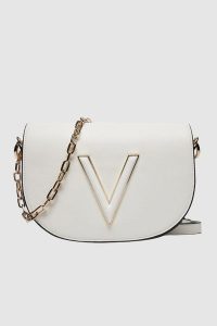 VALENTINO Biała torebka Coney Flap Bag. Białe listonoszki Valentino by Mario Valentino, bez wzorów, małe, bez dodatków. W wyprzedaży za 429,99 zł.
