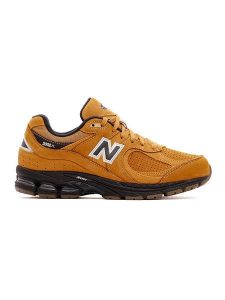 New Balance Skórzane sneakersy "M2002" w kolorze jasnobrązowym rozmiar: 37,5. Brązowe buty sportowe New Balance, bez wzorów, z materiału, bez zapięcia. Za 390,92 zł.