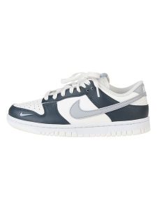 Nike Skórzane sneakersy "Dunk Low" w kolorze biało-szaro-granatowym rozmiar: 36,5. Białe trampki Nike, bez wzorów, z materiału, bez zapięcia. Za 334,60 zł.