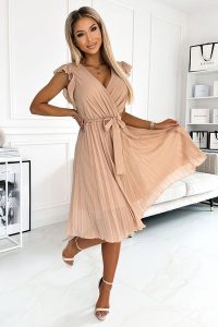 Plisowana sukienka midi - Beżowa. Brązowe sukienki NUMOCO, na wesele, m, bez wzorów, z materiału, bez kołnierzyka, bez ramiączek, midi. Za 319,90 zł.