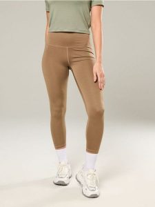 Legginsy sportowe z wysokim stanem - brązowy. Brązowe legginsy Sinsay, bez wzorów, z podwyższonym stanem. W wyprzedaży za 17,99 zł.