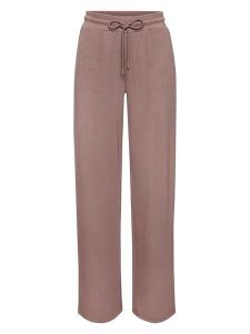 Copenhagen Studios Spodnie dresowe w kolorze jasnobrązowym rozmiar: 40/42. Brązowe spodnie dresowe Copenhagen Studios, bez wzorów, z dresówki. Za 115,95 zł.