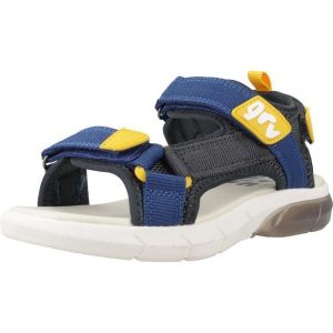 Sandały GARVALIN 242855G Niebieski. Niebieskie sandały GARVALIN, bez wzorów, z syntetyku, bez obcasa, bez zapięcia. Za 127,99 zł.