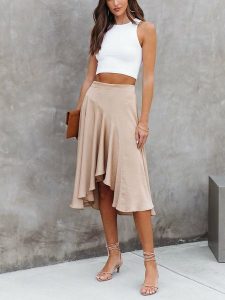 Milan Kiss Spódnica w kolorze beżowym rozmiar: XL. Brązowe spódnice Milan Kiss, xl, bez wzorów, midi. Za 118,01 zł.