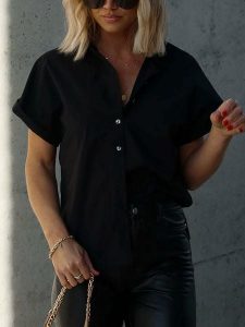LA Angels Bluzka w kolorze czarnym rozmiar: M. Czarne bluzki LA Angels, m, bez wzorów, z bawełny, bez kołnierzyka, bez ramiączek. Za 175,67 zł.
