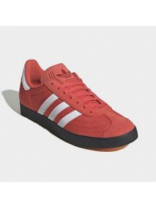 Adidas Skórzane sneakersy "Gazelle" w kolorze pomarańczowym rozmiar: 38,5. Pomarańczowe trampki ADIDAS, bez wzorów, bez zapięcia. Za 283,48 zł.