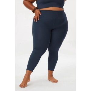 Damskie legginsy 7/8 Girlfriend Collective Compressive High-Rise. Niebieskie legginsy GIRLFRIEND COLLECTIVE, bez wzorów. Za 389,50 zł.