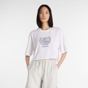 Koszulka damska New Balance WT51935WT – biała. Białe bluzki New Balance, xl, bez wzorów, z bawełny, bez kołnierzyka, bez ramiączek. Za 129,99 zł.