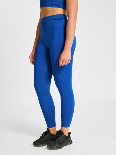 Damskie legginsy z wysokim stanem Hummel TIF. Niebieskie legginsy Hummel, bez wzorów, z materiału, z podwyższonym stanem. Za 129,91 zł.