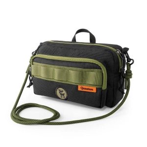 Torba na ramię wielopozycyjna QUNATURE. Zielone torby podróżne i sportowe QUNATURE, bez wzorów, z materiału, na ramię, małe. Za 115,60 zł.