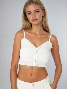 Weekday Top w kolorze białym rozmiar: S. Białe topy Weekday, s, bez wzorów, bez kołnierzyka, bez ramiączek. Za 43,68 zł.