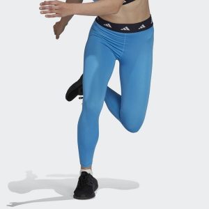 Legginsy damskie adidas Techfit. Niebieskie legginsy ADIDAS, bez wzorów. Za 128,99 zł.