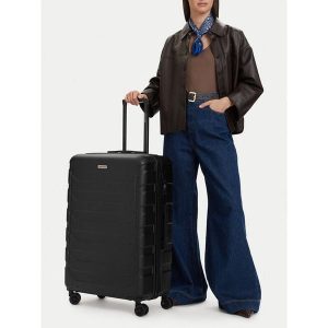 Walizka duża GINO ROSSI. Czarne walizki Gino Rossi, bez wzorów, duże. Za 299,99 zł.
