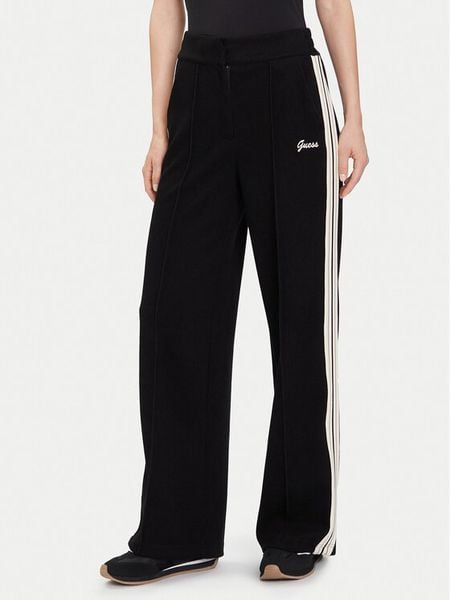 Guess Spodnie dresowe V5BB16 KCX52 Czarny Wide Leg. Czarne spodnie dresowe Guess, xl, z aplikacjami, z dresówki. Za 249,99 zł.