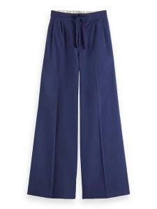 Scotch & Soda Spodnie w kolorze niebieskim rozmiar: L/L32. Niebieskie spodnie z wysokim stanem Scotch & Soda, bez wzorów, z bawełny, z podwyższonym stanem. Za 217,53 zł.