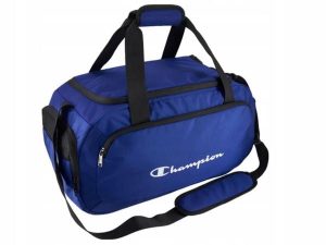 TORBA CHAMPION SPORTOWA 802391-BS003 na siłownię fitness trening basen. Niebieskie torby podróżne i sportowe Champion, bez wzorów, z materiału, do ręki, małe. Za 169,00 zł.