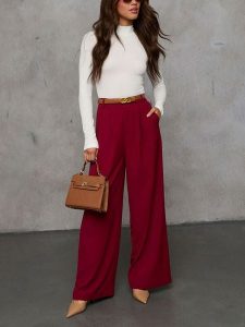 LA Angels Spodnie w kolorze bordowym rozmiar: M. Czerwone spodnie z wysokim stanem LA Angels, bez wzorów, z materiału, z podwyższonym stanem. Za 191,88 zł.