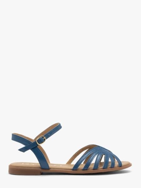 Niebieskie sandały damskie płaskie. Niebieskie sandały Ryłko, bez wzorów, ze skóry, bez obcasa, na płaskiej podeszwie, bez zapięcia. Za 329,99 zł.