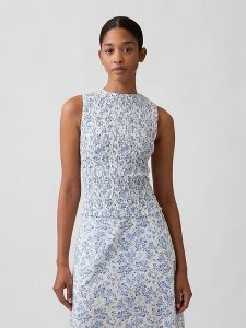 GAP Top w kolorze błękitno-białym rozmiar: XL. Białe topy GAP, xl, bez wzorów, bez kołnierzyka, bez ramiączek. Za 88,64 zł.