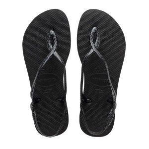 Klapki Havaianas Model 4129697 Kolor Czarny. Czarne klapki Havaianas, bez wzorów, z gumy, bez obcasa. Za 153,50 zł.