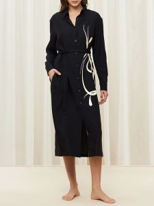 Triumph Sukienka w kolorze czarnym rozmiar: 38. Czarne sukienki Triumph, na co dzień, bez wzorów, z lyocellu, bez kołnierzyka, bez ramiączek, midi, proste. Za 131,43 zł.