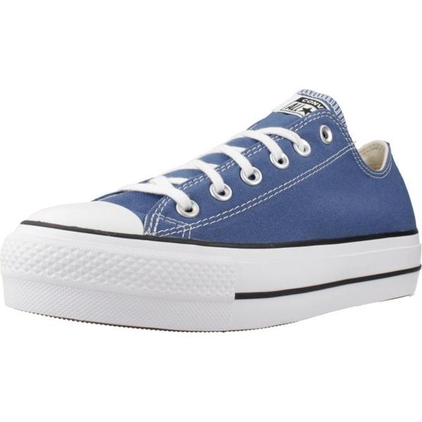 Buty CONVERSE CHUCK TAYLOR ALL STAR LIFT OX Niebieski. Niebieskie trampki Converse, bez wzorów, z tkaniny, bez zapięcia. Za 361,70 zł.