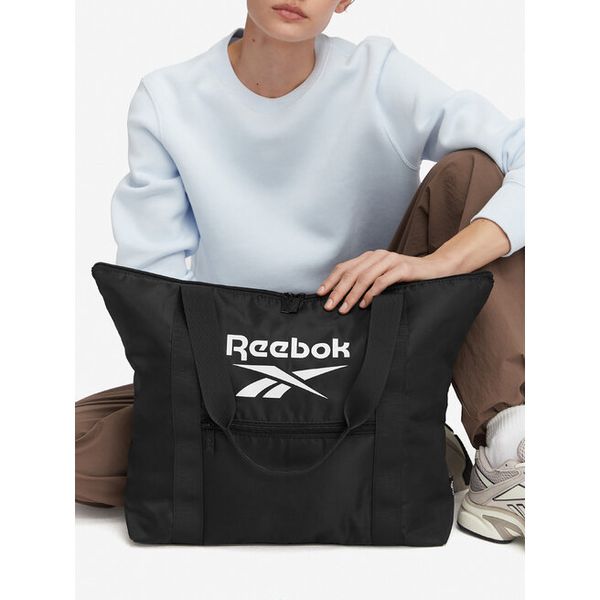 Torebka Reebok. Czarne shopper bag Reebok, bez wzorów, bez dodatków. Za 79,99 zł.