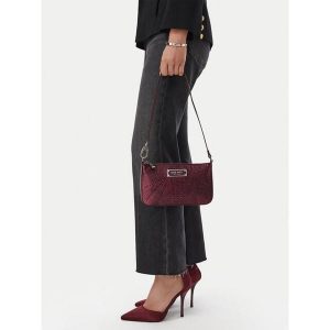 Torebka Nine West. Fioletowe torebki wieczorowe Nine West, bez wzorów, bez dodatków. Za 169,99 zł.