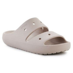Klapki Crocs Classic Sandal V2 209403-214 beżowy. Brązowe klapki bez wzorów, z otwartym noskiem, bez obcasa. Za 271,50 zł.
