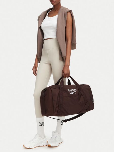 Reebok Torba sportowa CWBEO-RBK-B-001-08 Brązowy ciemny. Brązowe torby podróżne i sportowe Reebok, bez wzorów, z materiału. Za 129,99 zł.