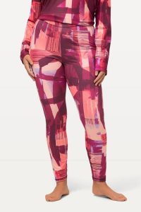 Damskie Narciarskie legginsy funkcyjne bardzo elastyczne z recyklingu. Fioletowe legginsy Ulla Popken, bez wzorów, z elastanu. Za 223,99 zł.