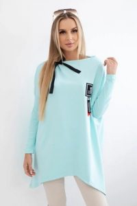 Bluza oversize z asymetrycznymi bokami miętowa. Zielone bluzy KESI, l, bez wzorów, z bawełny, bez kaptura. Za 209,11 zł.