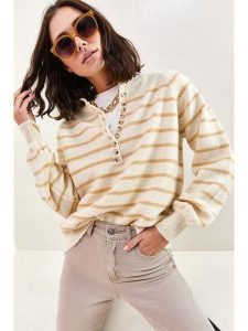 Bianco Lucci Sweter w kolorze kremowo-beżowym rozmiar: onesize. Brązowe swetry oversize Bianco Lucci, bez wzorów, bez ramiączek. Za 73,99 zł.