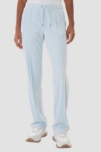 JUICY COUTURE Błękitne spodnie dresowe damskie z cyrkoniami Tina, Rozmiar XS. Niebieskie spodnie dresowe Juicy Couture, s, bez wzorów, z dresówki. Za 459,99 zł.