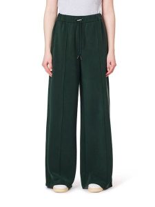 Scotch & Soda Spodnie w kolorze ciemnozielonym rozmiar: L. Zielone spodnie z wysokim stanem Scotch & Soda, bez wzorów, z materiału, z podwyższonym stanem. Za 229,95 zł.