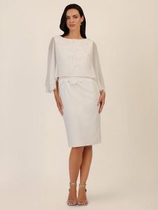 APART Sukienka w kolorze kremowym rozmiar: 40. Brązowe sukienki Apart, bez wzorów, z koronki, bez kołnierzyka, bez ramiączek, midi. Za 295,99 zł.