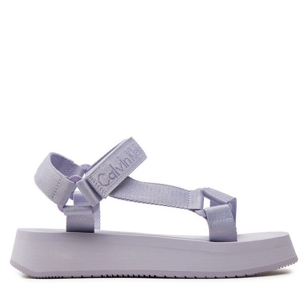 Sandały Calvin Klein Jeans. Fioletowe sandały Calvin Klein Jeans, bez wzorów, z jeansu, bez obcasa, na płaskiej podeszwie, bez zapięcia. Za 299,99 zł.