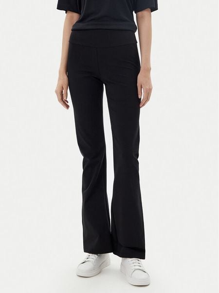 EA7 Emporio Armani Legginsy 7W000081 AF12484 UC001 Czarny Flare Fit. Czarne legginsy EA7 Emporio Armani, bez wzorów, z bawełny. Za 259,99 zł.