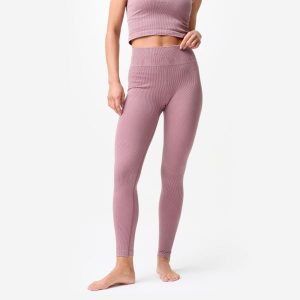 Legginsy do jogi i pilatesu damskie Domyos seamless. Fioletowe legginsy DOMYOS, bez wzorów, z elastanu. Za 129,99 zł.