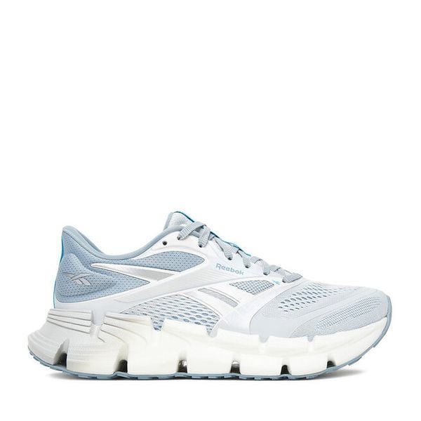 Buty do biegania Reebok. Niebieskie buty sportowe Reebok, bez wzorów, bez zapięcia, do biegania. Za 309,99 zł.