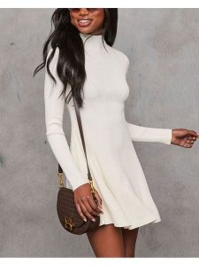 Milan Kiss Sukienka dzianinowa w kolorze kremowym rozmiar: L. Brązowe sukienki Milan Kiss, l, bez wzorów, z dzianiny, bez kołnierzyka, bez ramiączek, mini. Za 165,99 zł.