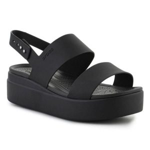 Sandały Crocs Brooklyn Low Wedge 206453-060 czarne. Czarne sandały bez wzorów, z materiału, bez obcasa, na platformie, bez zapięcia. Za 367,32 zł.