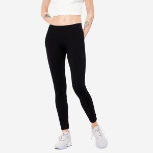 Legginsy fitness damskie Nyamba 100 Salto. Czarne legginsy DOMYOS, bez wzorów, z bawełny, długie. Za 29,99 zł.