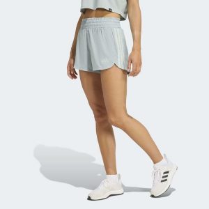 Spodenki fitness damskie ADIDAS 3S Pacer. Niebieskie szorty ADIDAS, bez wzorów, ze skóry, klasyczne, z podwyższonym stanem. Za 159,99 zł.