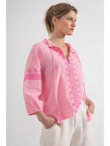 Josephine & Co Bluzka w kolorze różowym rozmiar: 40. Różowe bluzki Josephine & Co, bez wzorów, z bawełny, bez kołnierzyka, bez ramiączek. Za 131,74 zł.