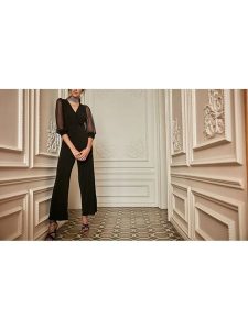 Milan Kiss Kombinezon w kolorze czarnym rozmiar: XL. Czarne kombinezony Milan Kiss, xl, bez wzorów, bez kołnierzyka, bez ramiączek. Za 165,99 zł.