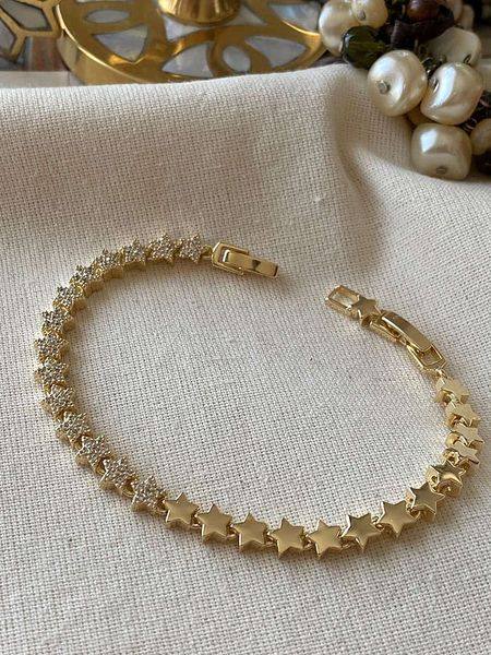 Luseera Pozłacana bransoletka z cyrkoniami rozmiar: onesize. Żółte bransoletki Luseera, z cyrkonią, pozłacane. Za 130,50 zł.