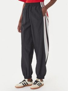 Adidas Spodnie dresowe Sport Santiago KC9116 Czarny Loose Fit. Czarne spodnie dresowe ADIDAS, s, bez wzorów, z dresówki. Za 349,99 zł.