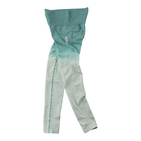 Second life - Legginsy damskie do jogi Gymshark turkusowe - Jak nowy. Niebieskie legginsy Gymshark, bez wzorów, z materiału. Za 106,46 zł.